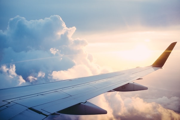 Image of sky taken from inside an airplane